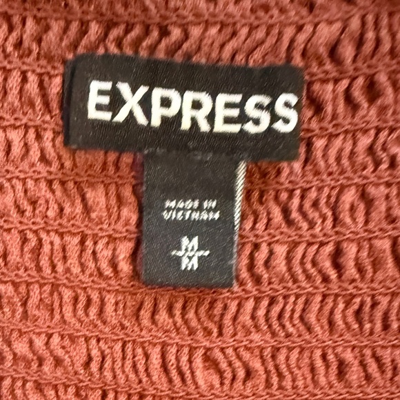 Express. Size M. Rust Color. - Picture 3 of 4